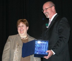 Publisher Steve Jahn presented Jill with her 2011 Top Women in Finance award.